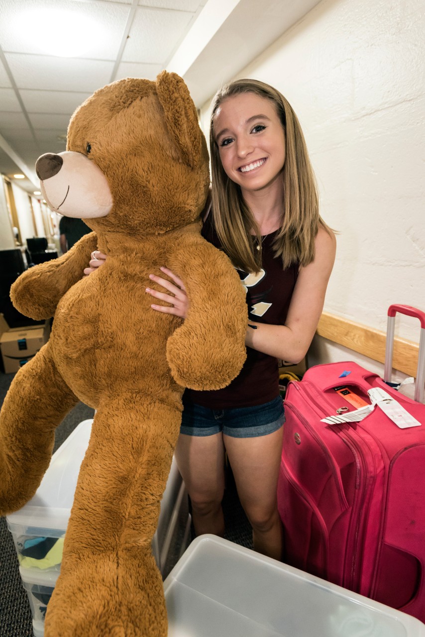 Carroll School of Management student Olivia Grohe '21 and a friend settle in on Upper Campus. (Frank Curran)