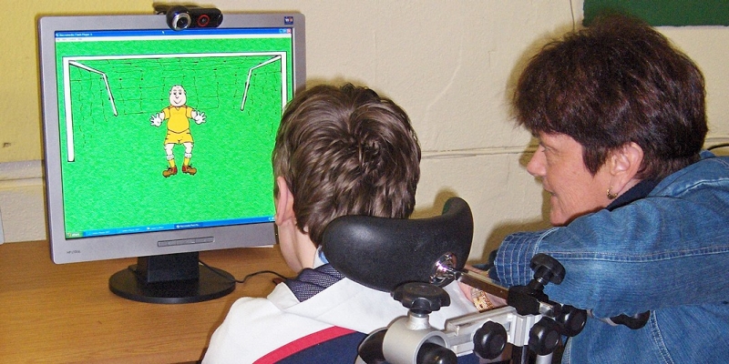 Patrick from The School of the Divine Child in Cork, Ireland pictured with Maureen Gates (recently retired from the Campus School), who was at the school to do a Camera Mouse training session.