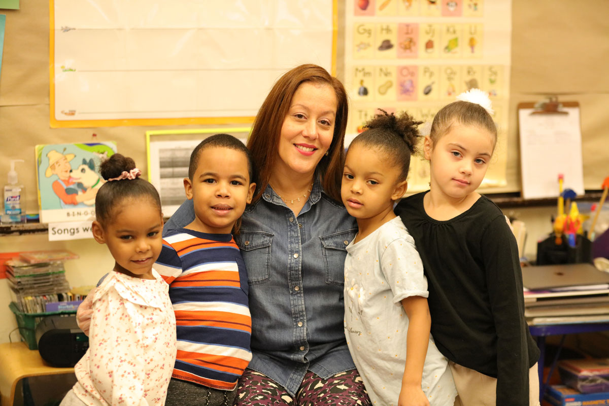 Teacher with four students