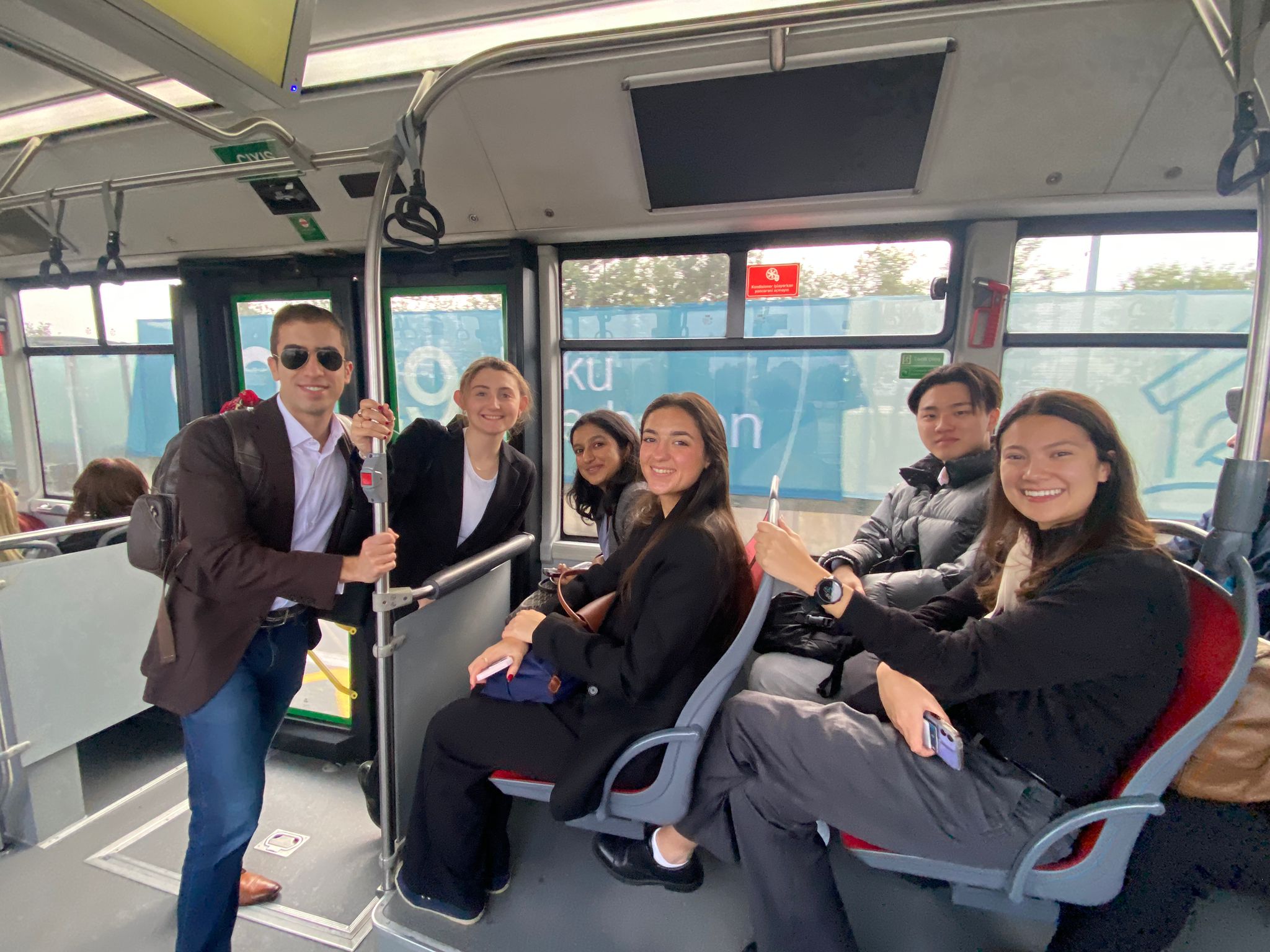 COP29 Delegates on the Bus