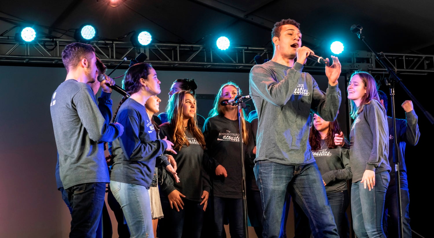 Singers performing on stage