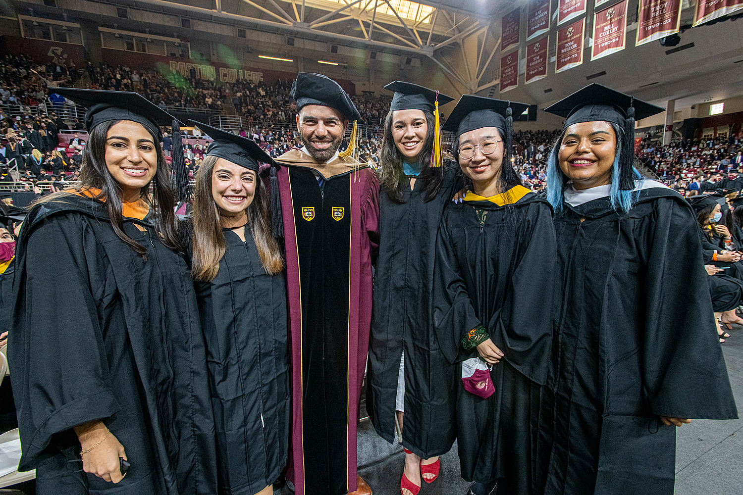 A group of students wearing caps and gowns