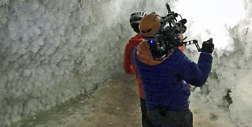 scientists in cave