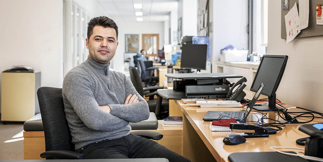 A man sitting at a desk