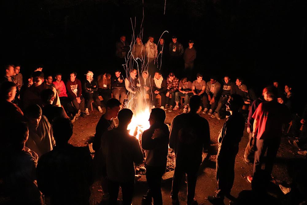 Students at a bonfire