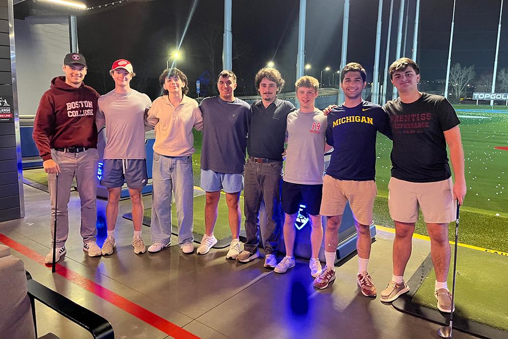 Students at a driving range