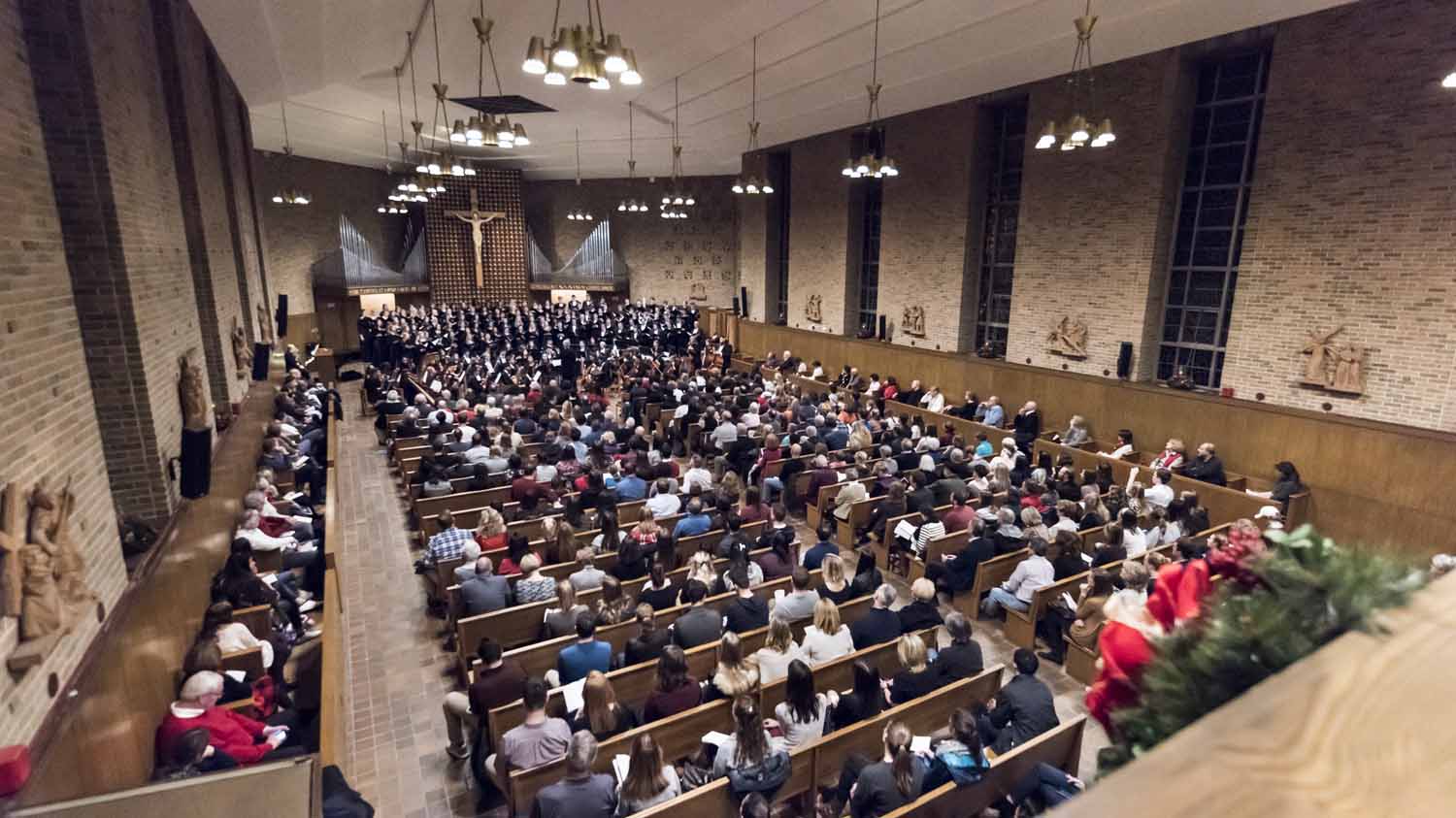 Coverage of the Chorale and Symphony Orchestra Christmas concert at Trinity Chapel on the Newton Campus. This marks the 25th anniversary of John Finney leading the Chorale.