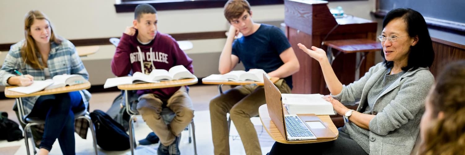 College students and teacher sitting in a cirle