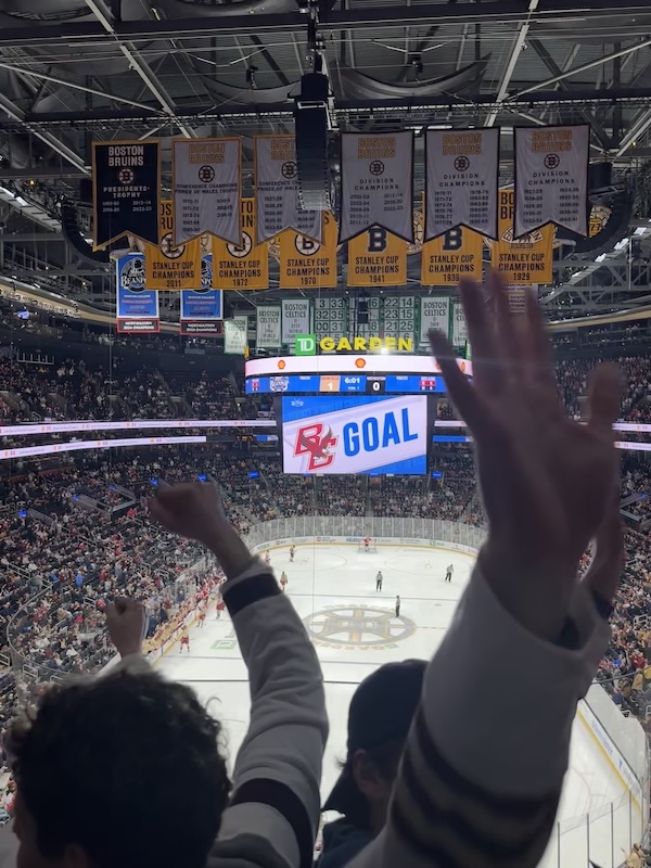 Students celebrating after BC scored at goal