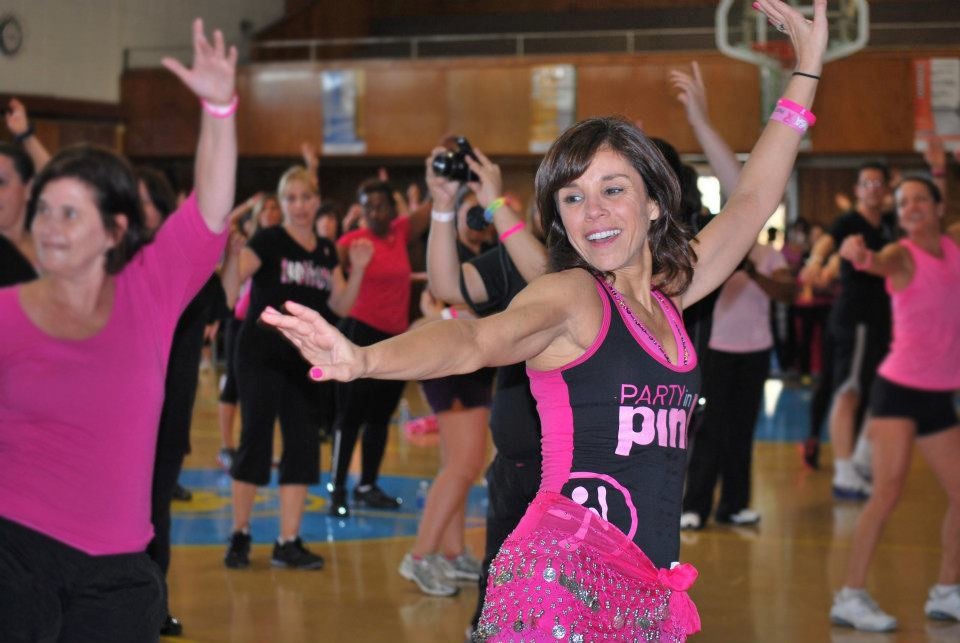 Michele Ayoub dancing at a fundraiser