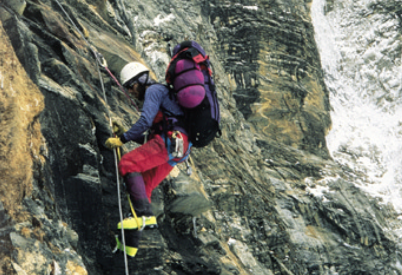 Montes scaling a rock face on his Mount Everest climb