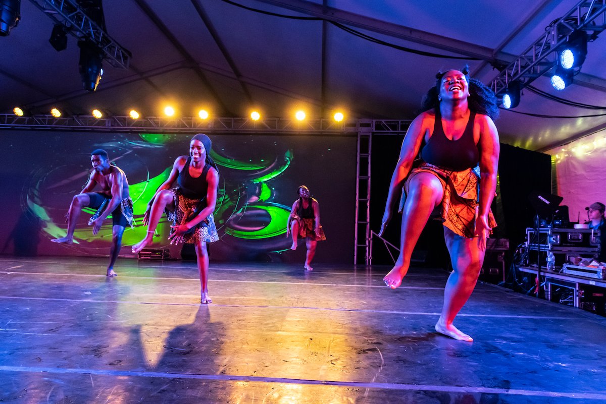 A group of dancers on stage