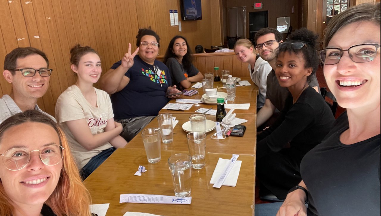 McMenamin lab members at a dining table