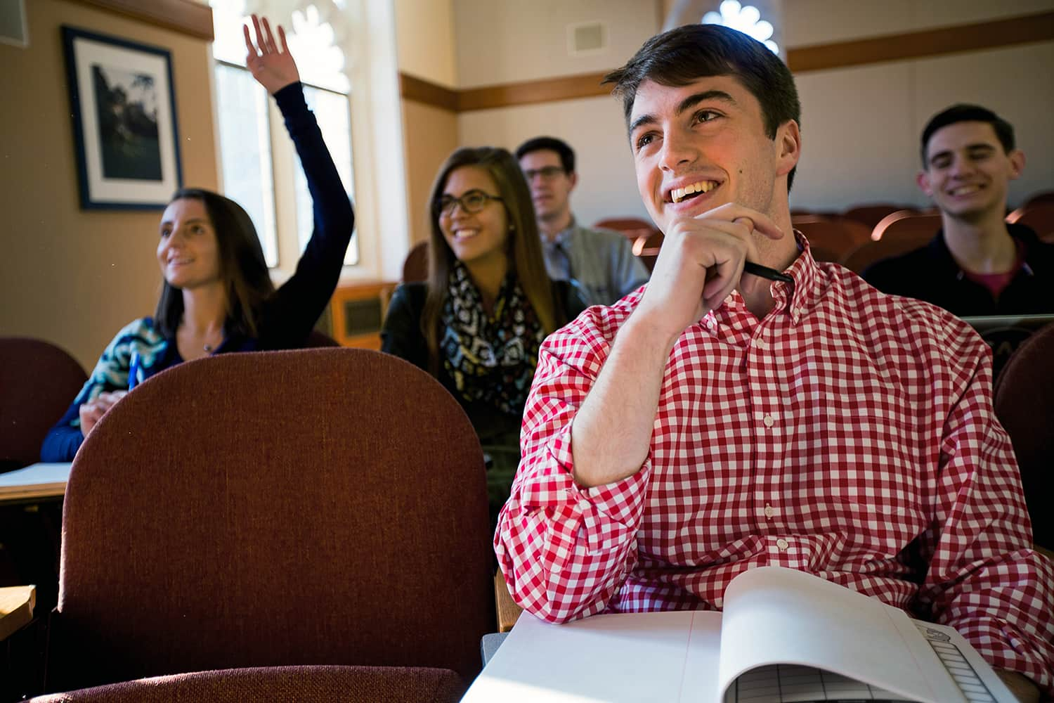 smiling students in a classroom