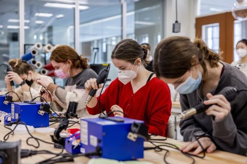 Students working in a maker lab.