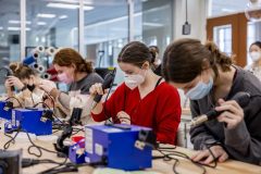 Students working in a maker lab.