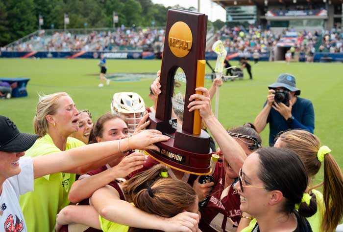 Photograph of the BC women's lacrosse players and coaching staff