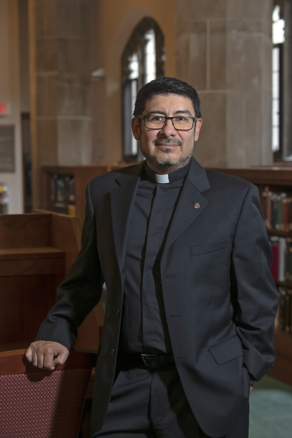 Newly appointed Assist. Prof. Alejandro Olayo-Mendez photographed in Bapst Library for use in the 10/10 issue of Chronicle.