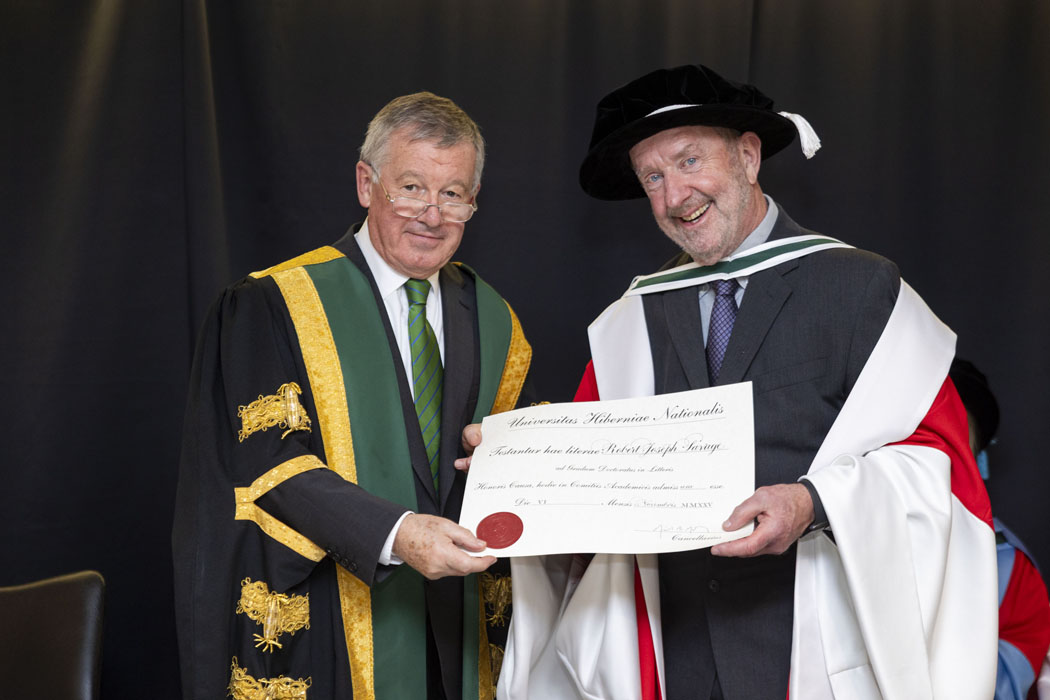 Rob Savage in academic regalia with NUI Chancellor Professor Michael Murphy. 