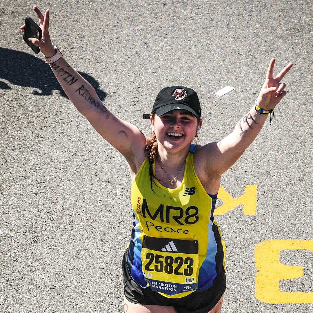 A runner crossing the finishline