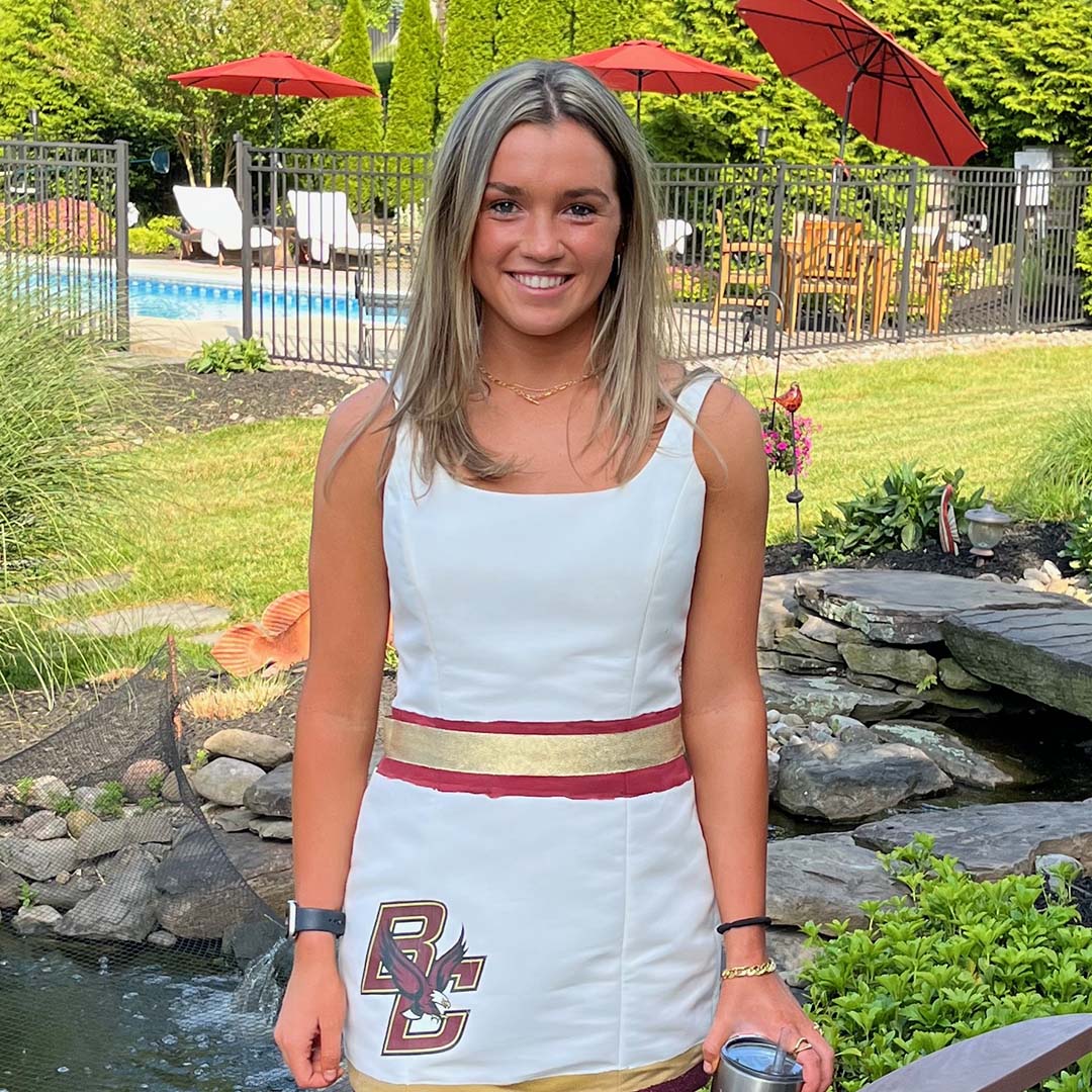 A woman in a white BC dress