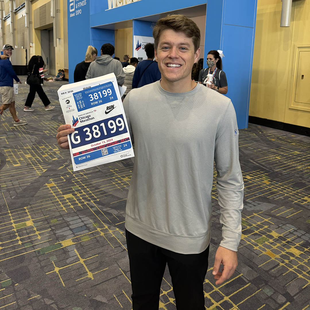 A man holding up a race bid
