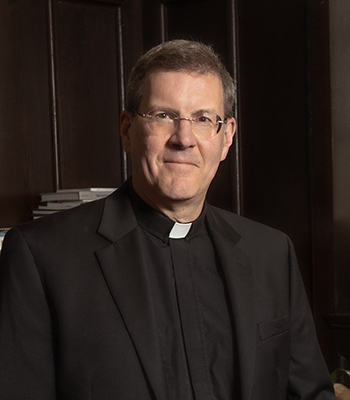 Gregory Kalscheur, SJ, Dean of the Morrissey College of Arts and Sciences photographed in the Dean's office and conference room in Gasson Hall.