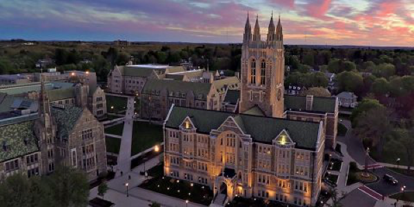 aerial shot of Gasson Hall at sunset