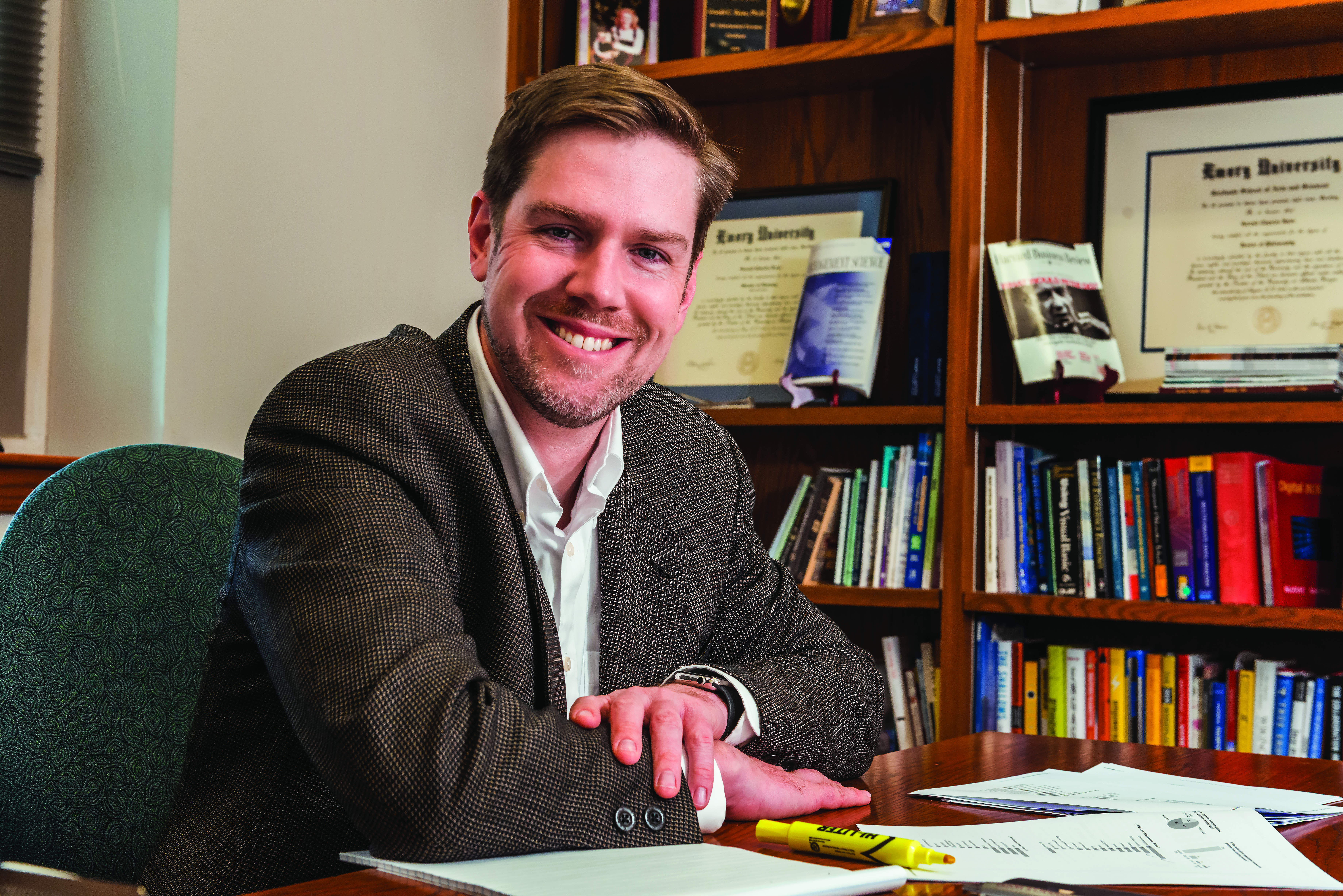 Professor Gerald Kane sits in his office